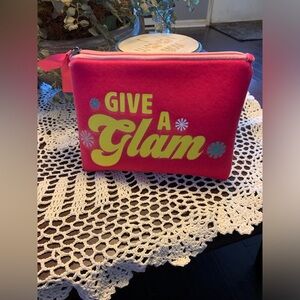 GIVE A GLAM POUCH WITH A BUNCH OF SAMPLES